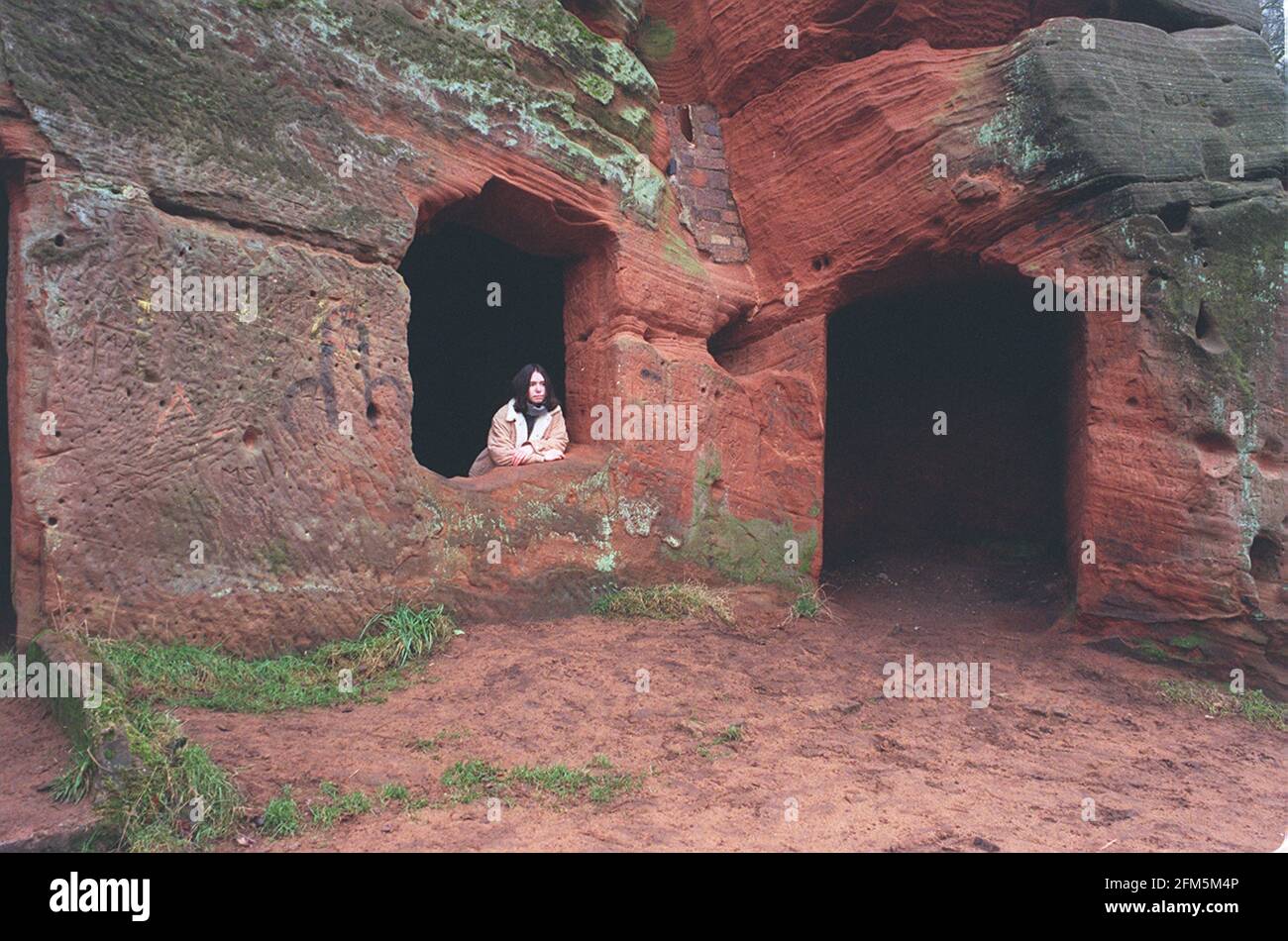 Rock houses cut into Kinver Pass in the West Midlands   140 people have applied to the National Trust to become custodians of these cave dwellings in return for free accommodation Stock Photo