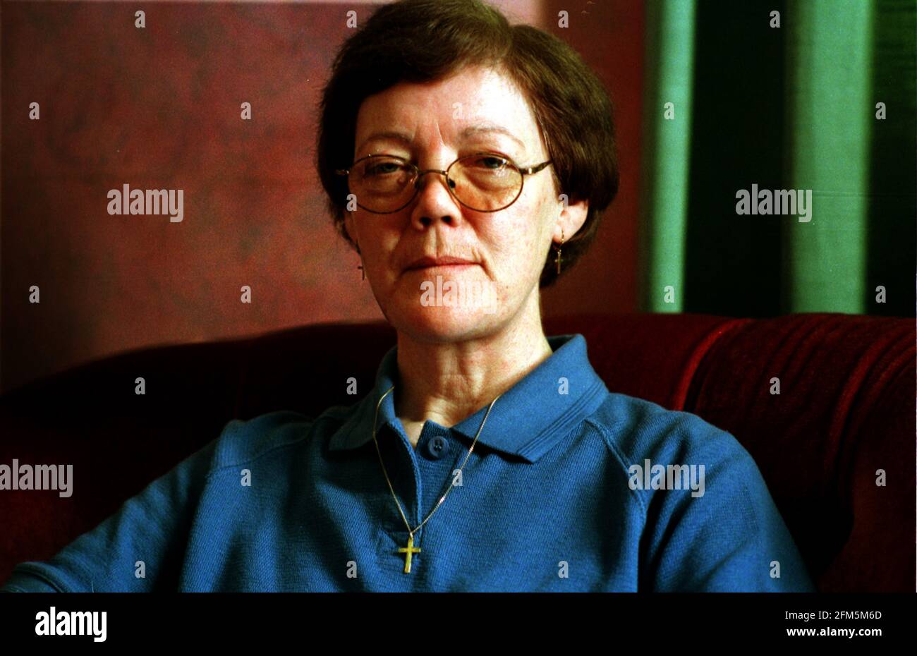 Josephine Cregan March 1999 who is being made redundant by the nuns at St  Michael's Convent in Streatham. She is photographed in her home, the lodge of the convent Stock Photo