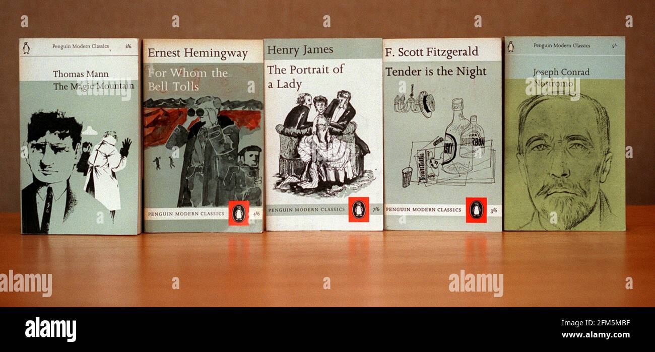 Penguin Modern Classics Paperback Books January 2000 Tender is the Night by F Scott Fitzgerald Nostromo by Joesph Conrad The Portrait of a Lady by Henry James  The Magic Mountain by Thomas Mann and For Whom the Bell Tolls by Ernest Hemingway Stock Photo