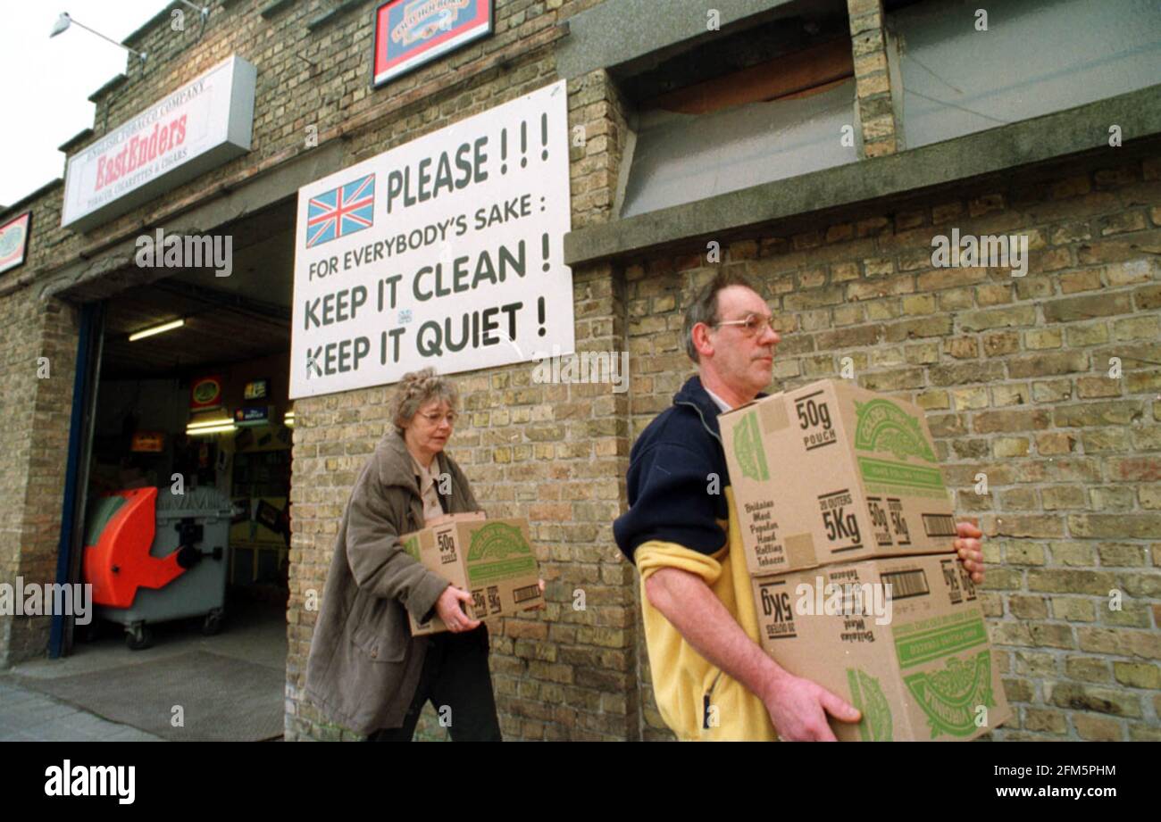 Graham and Heather Llewellyn leaving the Eastenders shop in Adinkerke,  Belgium. with tobacco they have just bought Stock Photo
