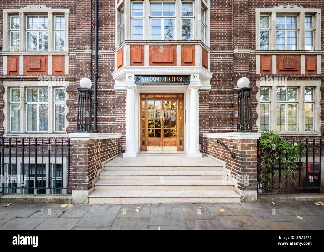 Sloane House, London. Traditional British 1930's Art Deco antrance and façade architecture to a West London apartment mansion block near Sloane Square Stock Photo