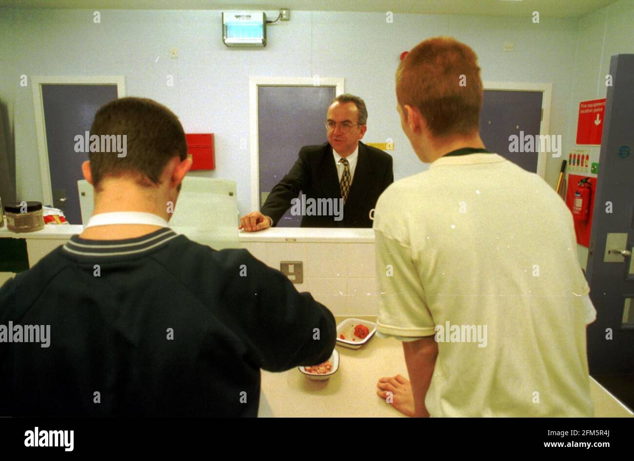 Feltham Prison Hi Res Stock Photography And Images Alamy   Feltham Young Offender Institution Juvenile Unit Martin Narey Director General Of The Prison Service Talking To Two Offenders In The Kitchen Of The Education Unit 2FM5R4J 