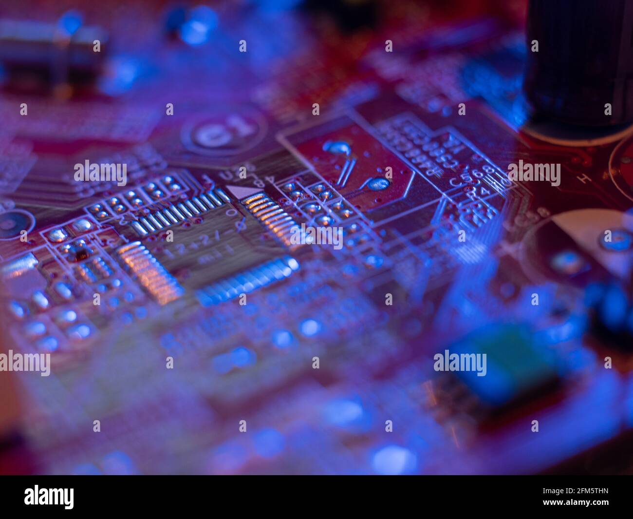 Microchips, computer boards, close-up, low depth of field, technological background. Stock Photo