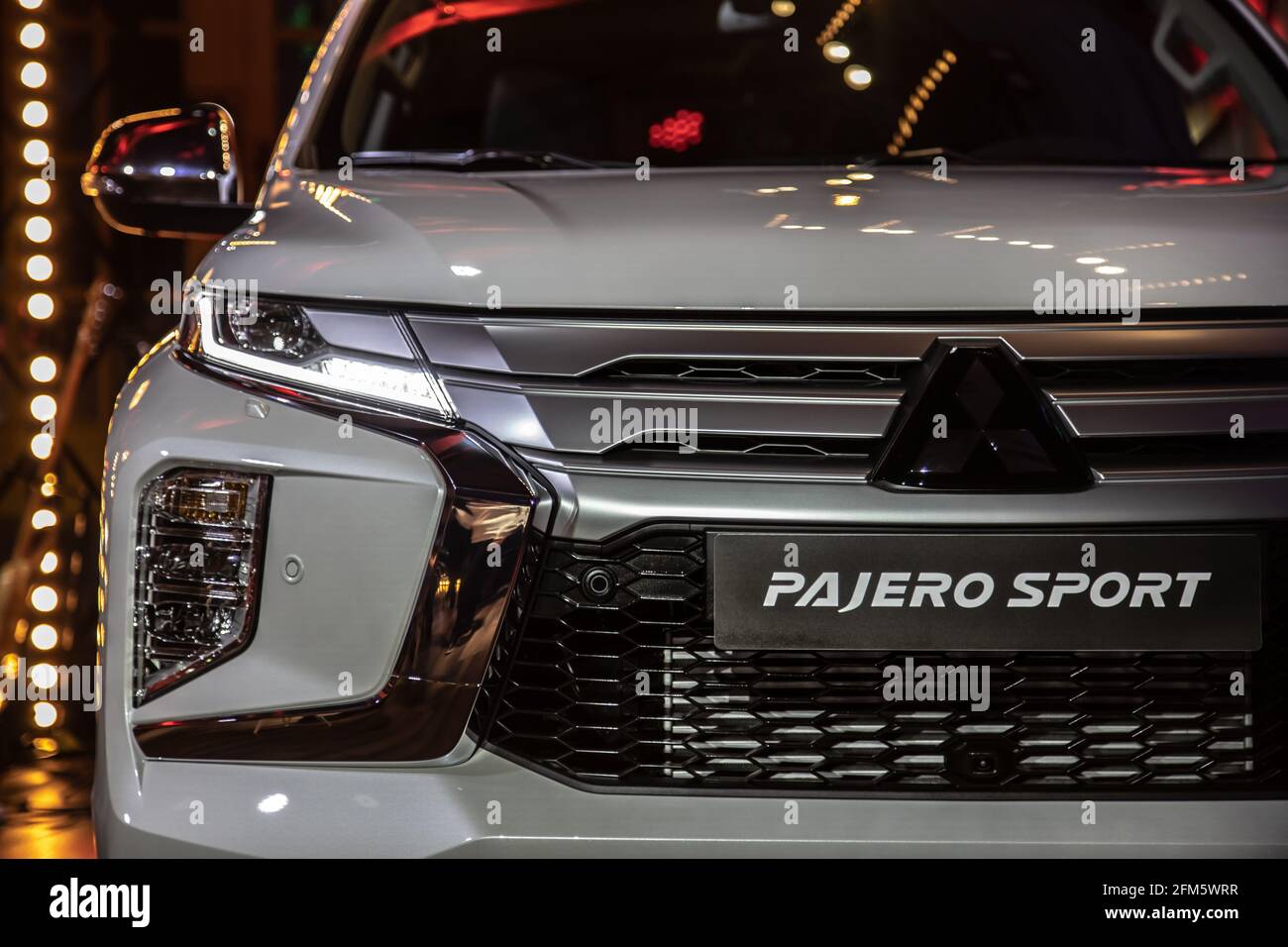 Moscow, Russia - February 17, 2021: All new Mitsubishi Pajero Sport. Montero. Car stand at the parking box, dark light. Stock Photo