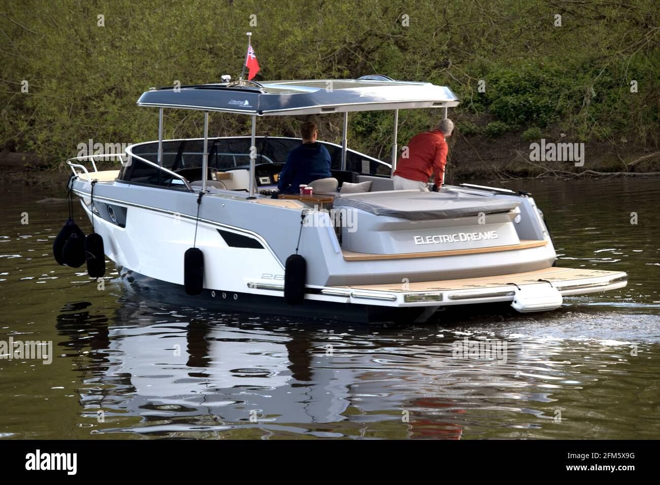 Electric motor launch on River Avon at Eckington Lock May Bank Holiday 2021 UK Stock Photo Alamy
