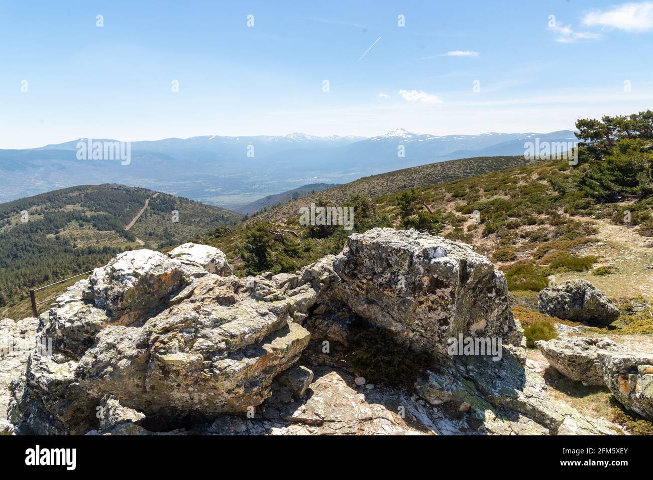 Landscape of rocks and mountains with clear sky in spring Stock Photo