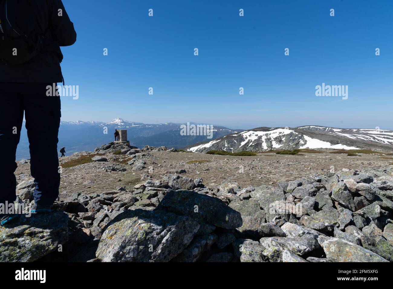 Landscape of rocks and mountains with clear sky in spring Stock Photo