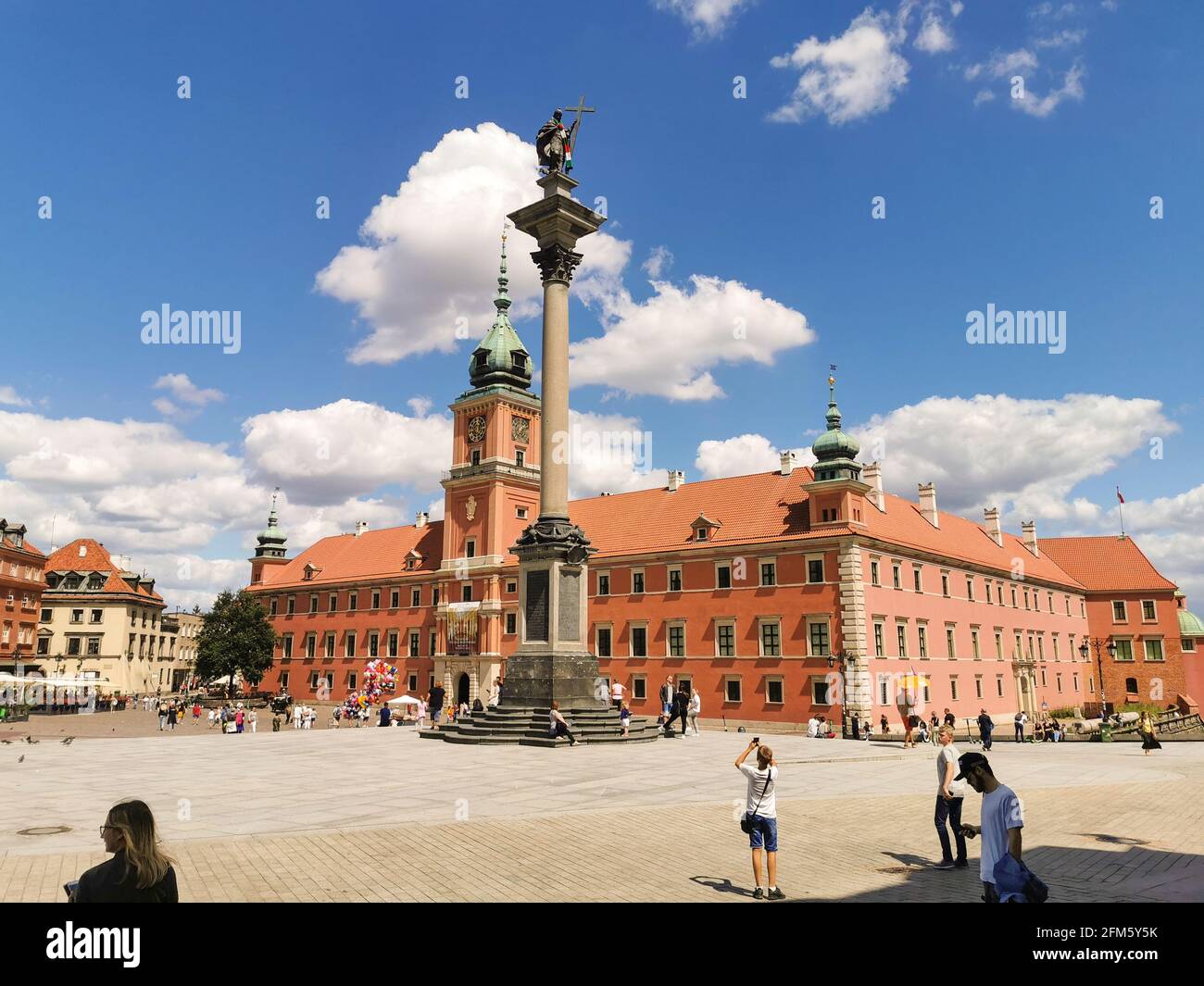 Warsaw, Poland: Old town in Warsaw, Poland. The Royal Castle and Sigismund's Column called Kolumna Zygmunta, Plac Zamkowy horizontal photo Stock Photo