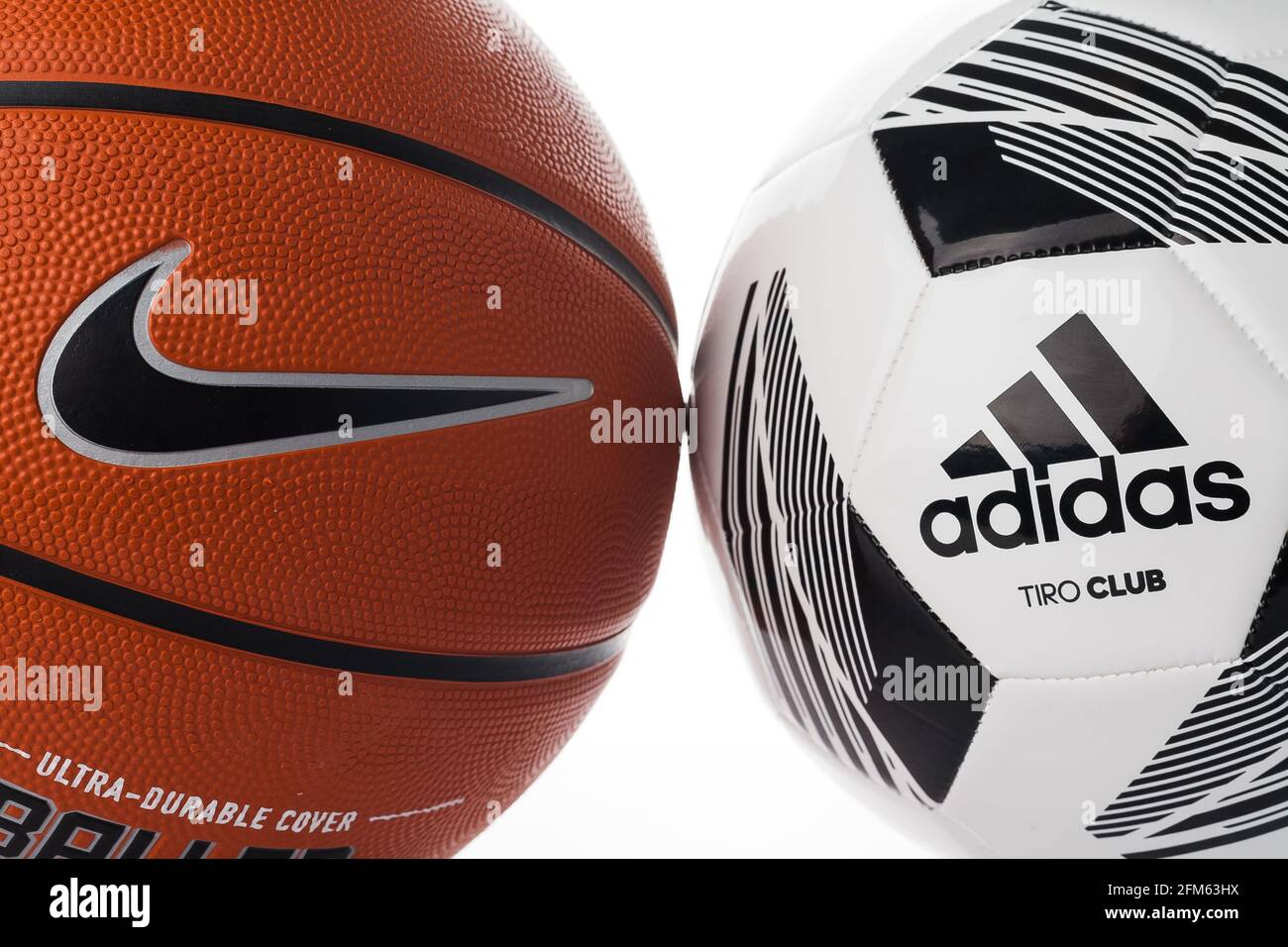 Adidas and Nike brand balls. Basketball and soccer balls on a white  background. Adidas football and Nike basketball Stock Photo - Alamy