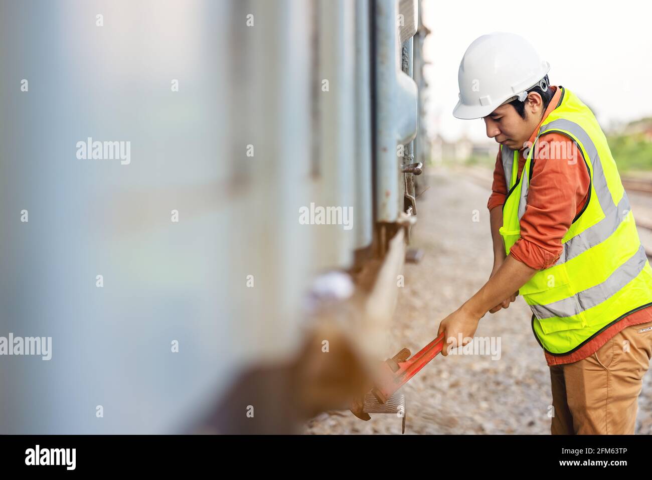 Engineer man checking train before service erformed various system ...