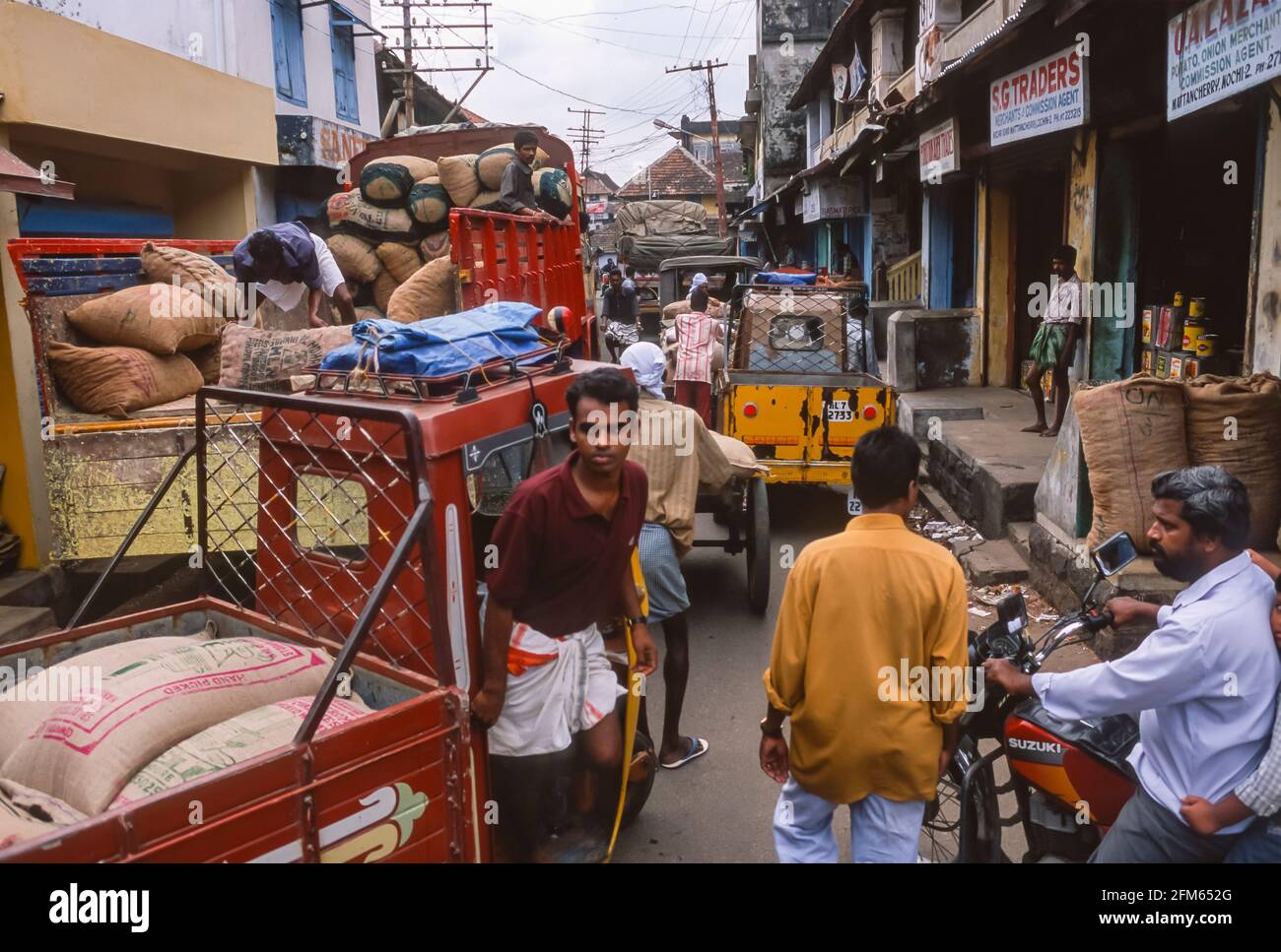 COCHIN, KERALA, INDIA Traffic jam of vehicles and people in warehouse