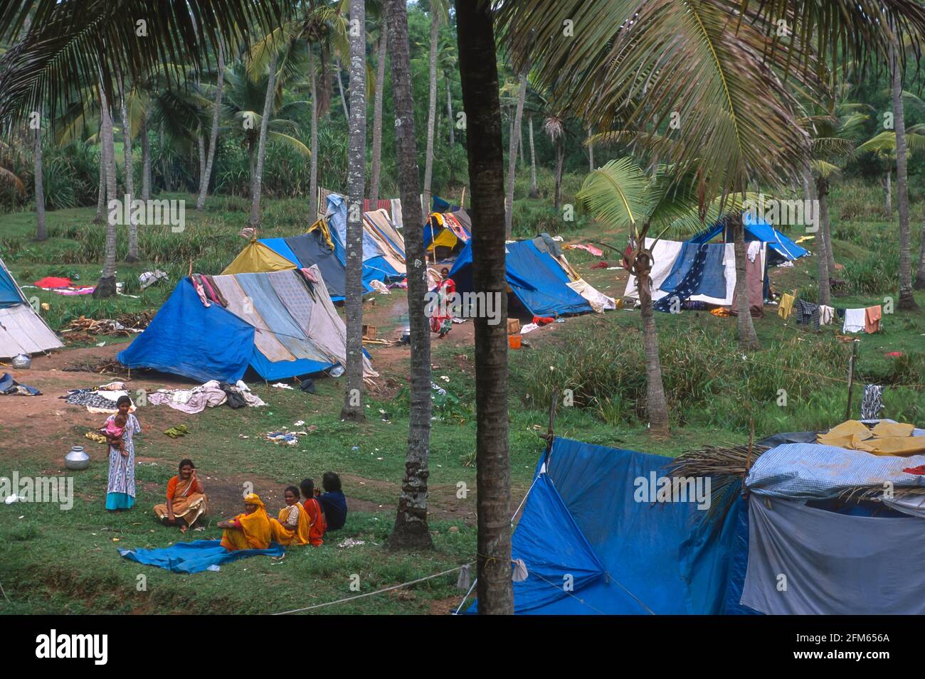 KERALA, INDIA - Migrant itinerant workers from Andhra Pradesh camped in Western Ghats mountains, Kottayam district. Stock Photo