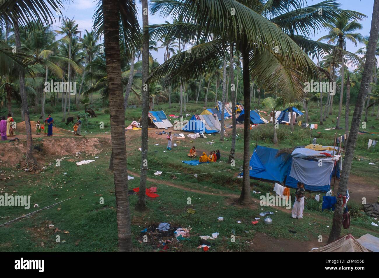 KERALA, INDIA - Migrant itinerant workers from Andhra Pradesh camped in Western Ghats mountains, Kottayam district. Stock Photo