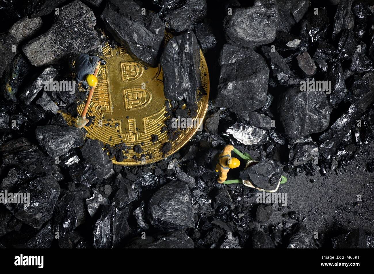 Galati, Romania - April 27, 2021 Construction site with miniature workers  cryptocurrency mining Bitcoin Stock Photo - Alamy