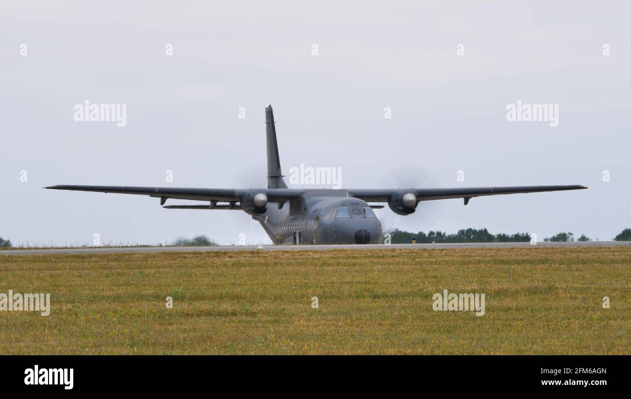 Evreux Air Base France JULY, 14, 2019 Parked airplane CASA CN-235-200M of French Air and Space Force with spinning propellers Stock Photo