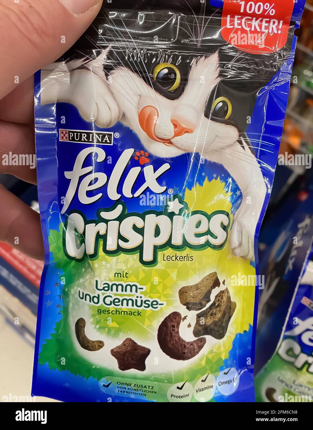 viersen germany may 6 2021 closeup of packet with logo lettering of felix crispies cat food in shelf of german supermarket 2FM6CN8
