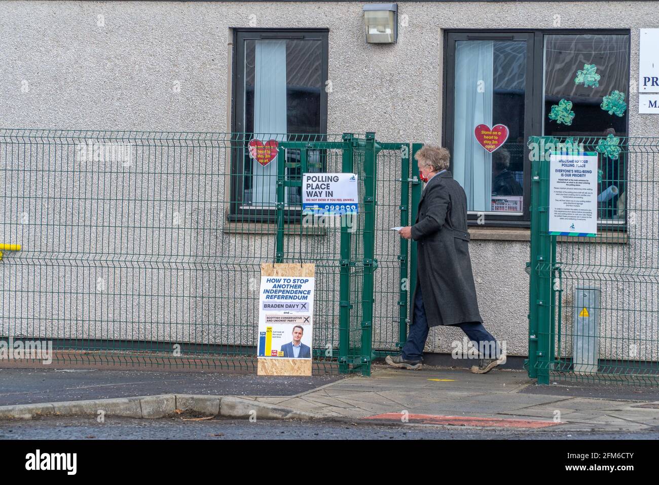 Montrose, Angus, Scotland, UK, 6th of May 2021: Members of the public turning out at the polling stations in Montrose, as the polling stations throughout Scotland open from 7am to 10pm, for members of the public to cast their votes in the 2021 Scottish elections. Polling station are heavily regulated by the covid-19 restrictions and guidelines. Angus North and Mearns Constituency seems to be a two horse race between, SNP Mairi Gougeon and Conservative Braden Davy. Credit:Barry Nixon/Alamy Live News Stock Photo