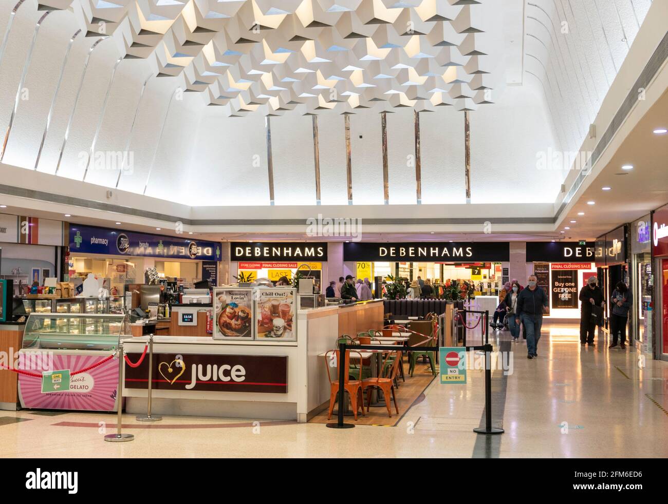 Debenhams department store and juice bar  inside the Four Seasons Shopping Centre, West Gate, Mansfield Nottinghamshire East Midlands England GB UK Stock Photo