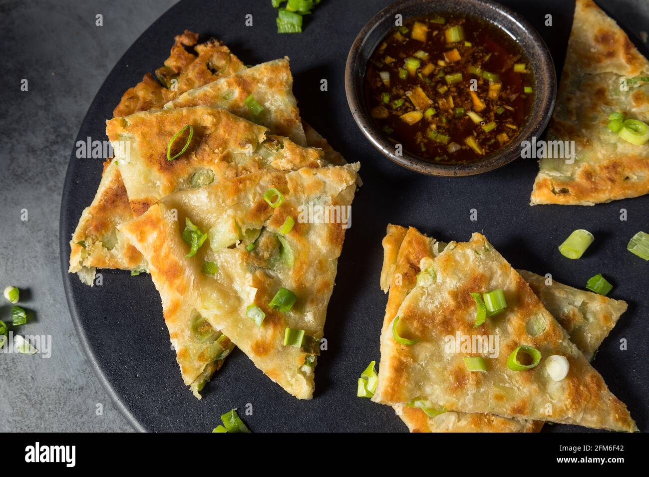 Homemade Chinese Scallion Pancake with Dipping Sauce Stock Photo