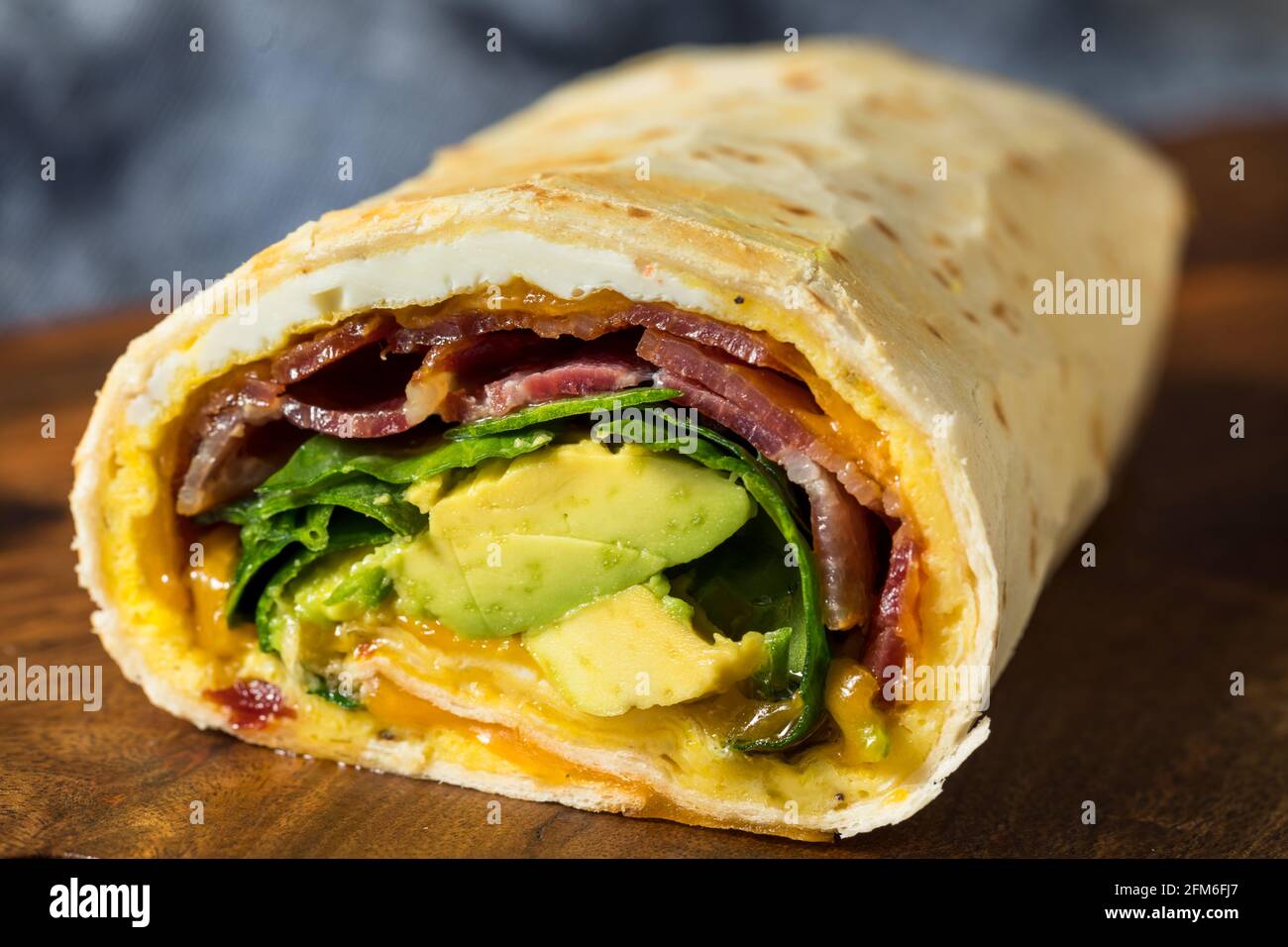 Homemade Healthy Trendy Breakfast Egg Burrito with Bacon and Avocado Stock Photo Alamy