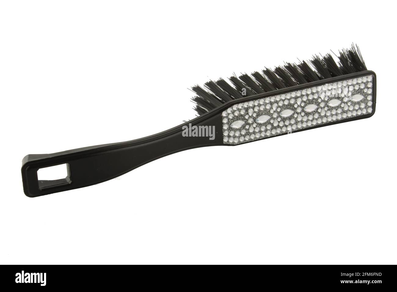 Embellished household brush, for the domestic goddess who has everything concept with copy space Stock Photo