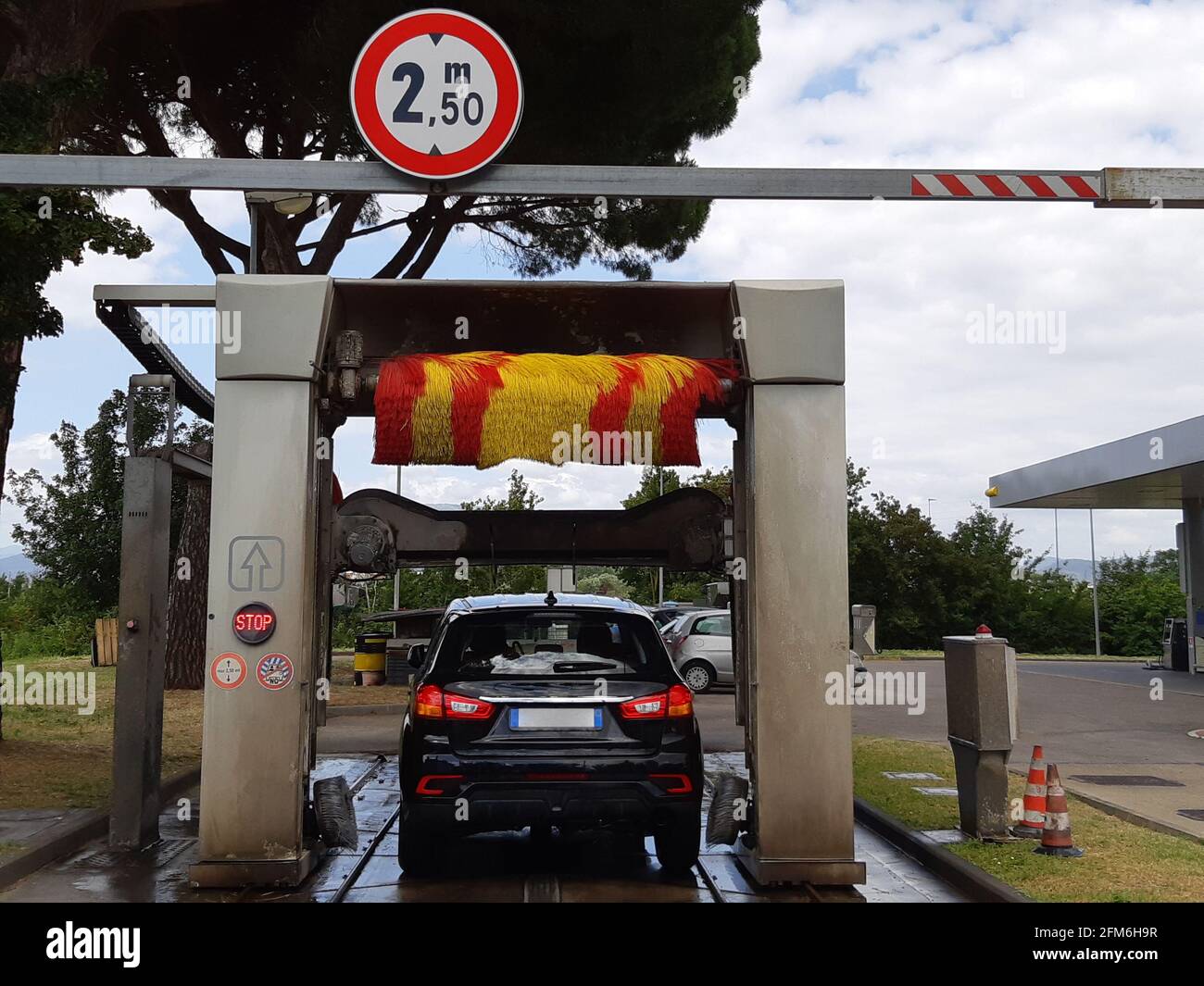 Car inside the automatic car wash in operation Stock Photo Alamy