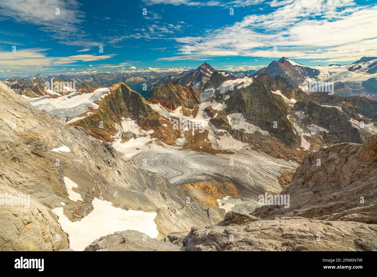 Panorama from Titlis suspension bridge on top of Titlis glacier in the Uri Alps. Cantons of Obwalden and Bern. Switzerland, Europe in summer season Stock Photo