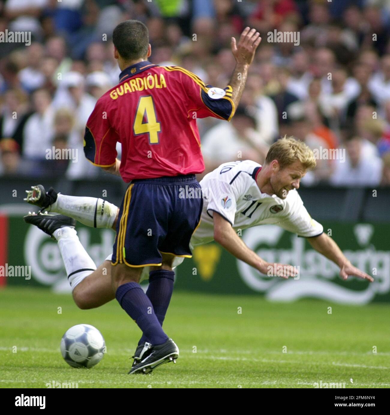Bent Skammelsrud of Norway takes a tumble  while Josep Guardiola of Spain tries to get out of the way Stock Photo