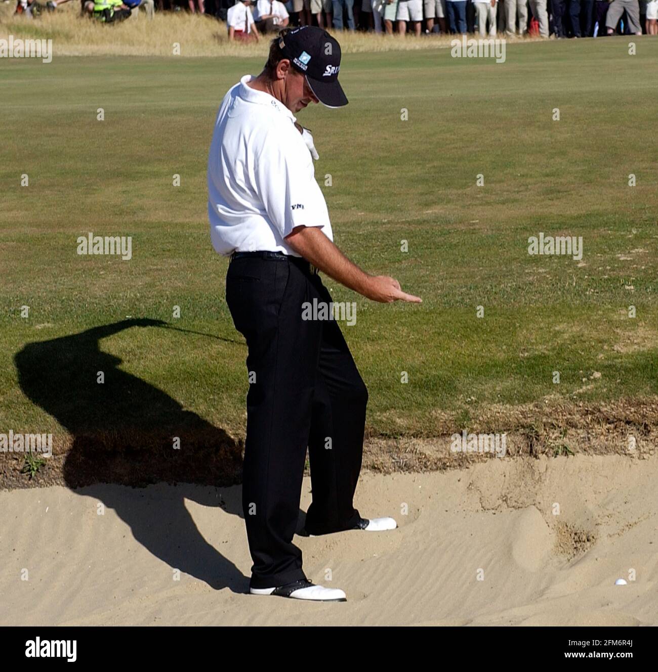 THE OPEN GOLF AT ROYAL ST GEORGES FINAL DAY THOMAS BJORN WATCHES HIS BALL  AFTER IT HAS ROLLED BACK INTO THE BUNKER AT THE 16TH FOR THE 2ND TIME  20/7/2003 PICTURE DAVID