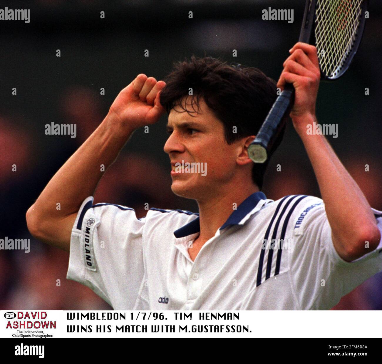 TIM HENMAN WINS HIS MATCH AGAINST MAGNUS 6-4 7-6 AND IS NOW THROUGH TO THE QUARTER FINALS AT WIMBLEDON Stock Photo - Alamy