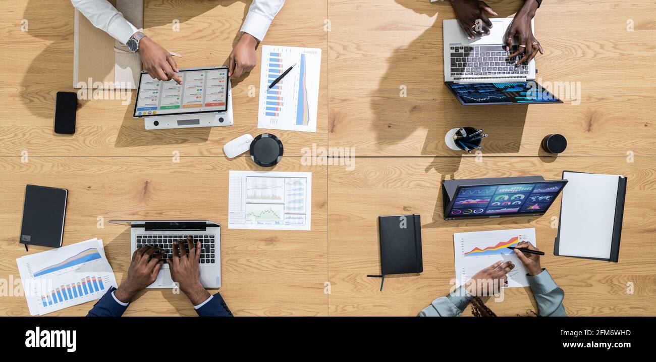 Overhead View Of African Business People Finance Meeting Stock Photo