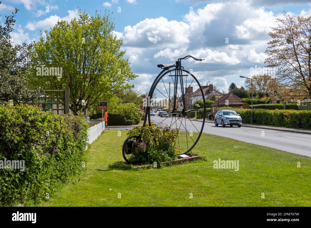 Giant Penny Farthing bicycle at the entrance to Sissinghurst village, to commemorate the Tour de France passing through the village Stock Photo