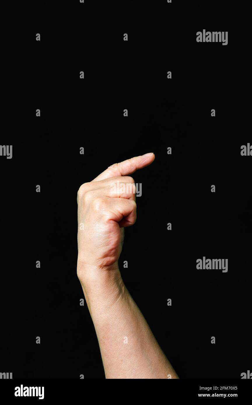 Hand making and showing Letter Z International sign language dark