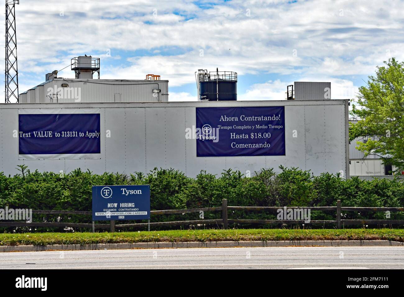 Emporia, KS, USA. 6th May, 2021. Now hiring signs in both English and