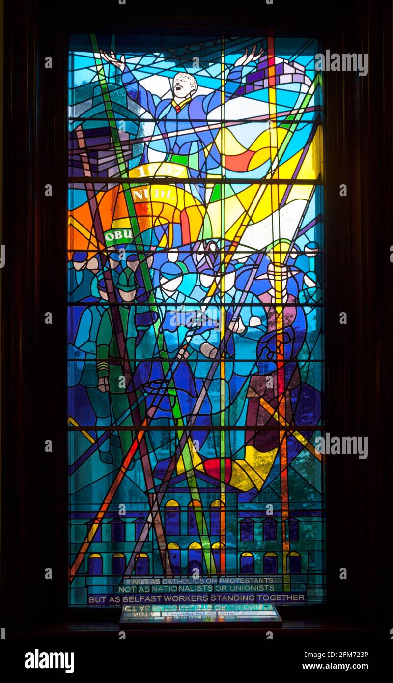 Centenary stained glass window in Belfast City Hall, Northern Ireland, of the dockers strike of 1907 led by James Larkin, designed by John McLaughin a Stock Photo