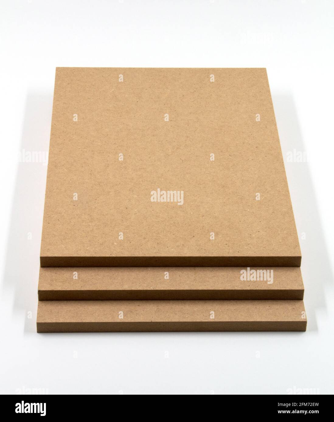 Three boards of raw MDF. Stock Photo