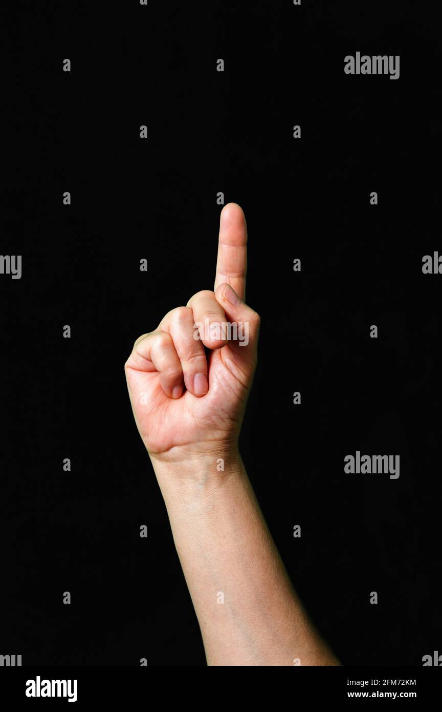 Hand making and showing Letter P International sign language dark background International sign language dark background Stock Photo