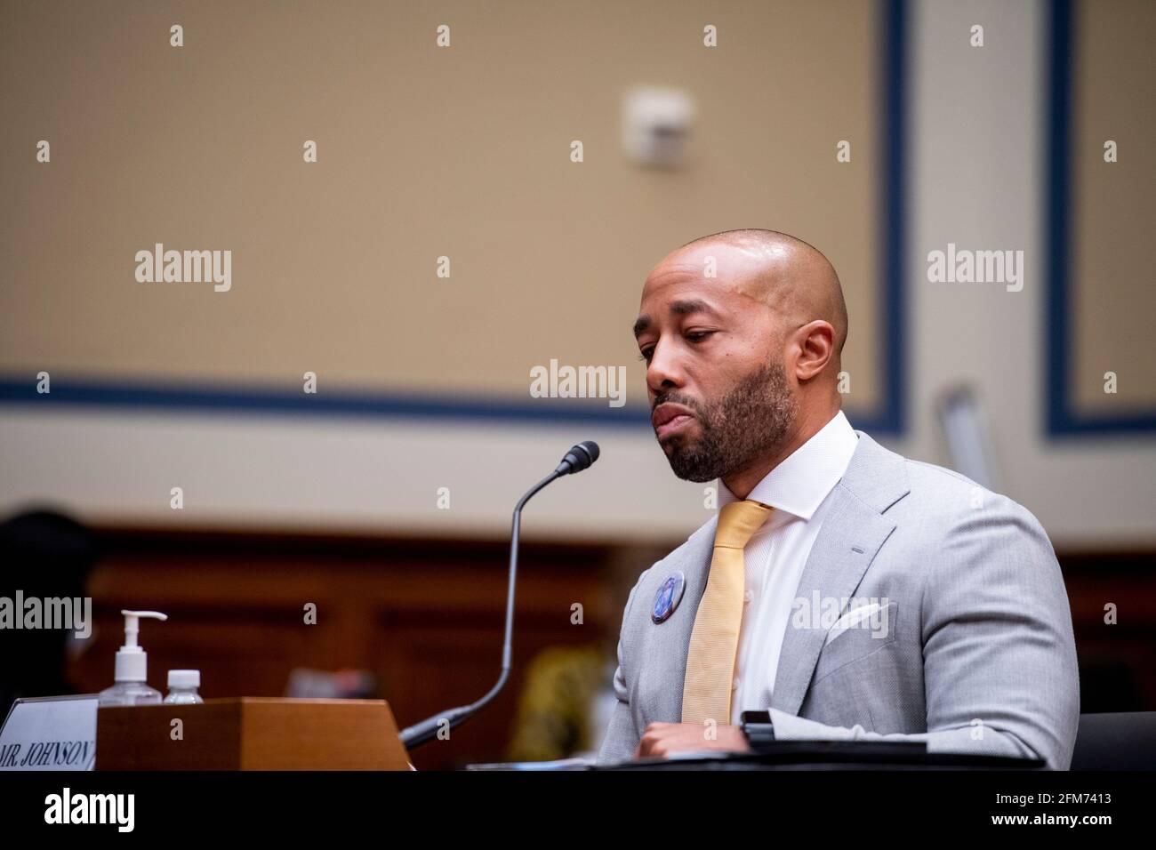 Washington, United States Of America. 06th May, 2021. Charles Johnson, husband of the late Kira Johnson and Founder of 4Kira4Moms, testifies about losing his wife during a routine c-section, as he appears for a House Committee on Oversight and Reform hearing “Birthing While Black: Examining Americas Black Maternal Health Crisis” in the Rayburn House Office Building in Washington, DC, Thursday, May 6, 2021. Credit: Rod Lamkey/CNP Photo via Credit: Newscom/Alamy Live News Stock Photo
