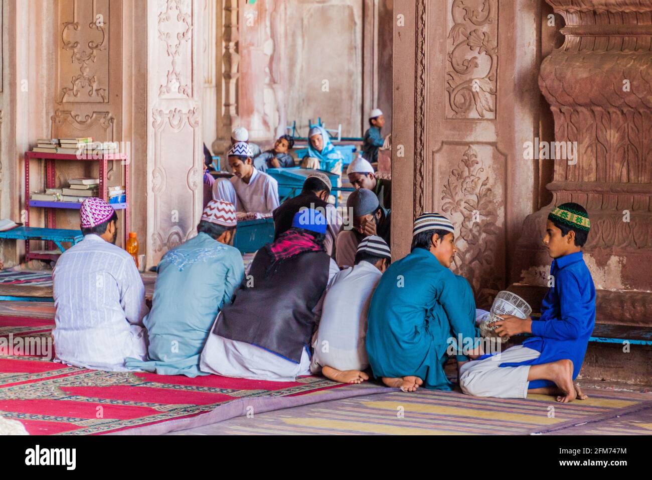 BHOPAL, INDIA - FEBRUARY 5, 2017: Quran students in the Taj-ul-Masjid mosque in Bhopal, Madhya Pradesh state, India Stock Photo