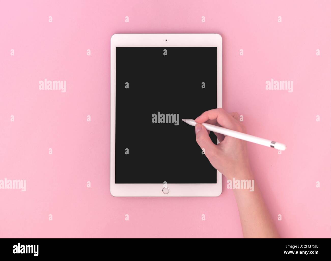 Kharkov, Ukraine - May 5, 2021: Woman using Apple iPad with stylus pen,  mockup of digital tablet for artist, top view photo Stock Photo - Alamy