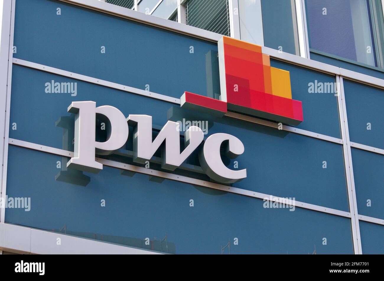 St. Gallen, Switzerland - 14th April 2021 :PWC sign in Switzerland. PricewaterhouseCoopers is a multinational professional services network of firms, Stock Photo