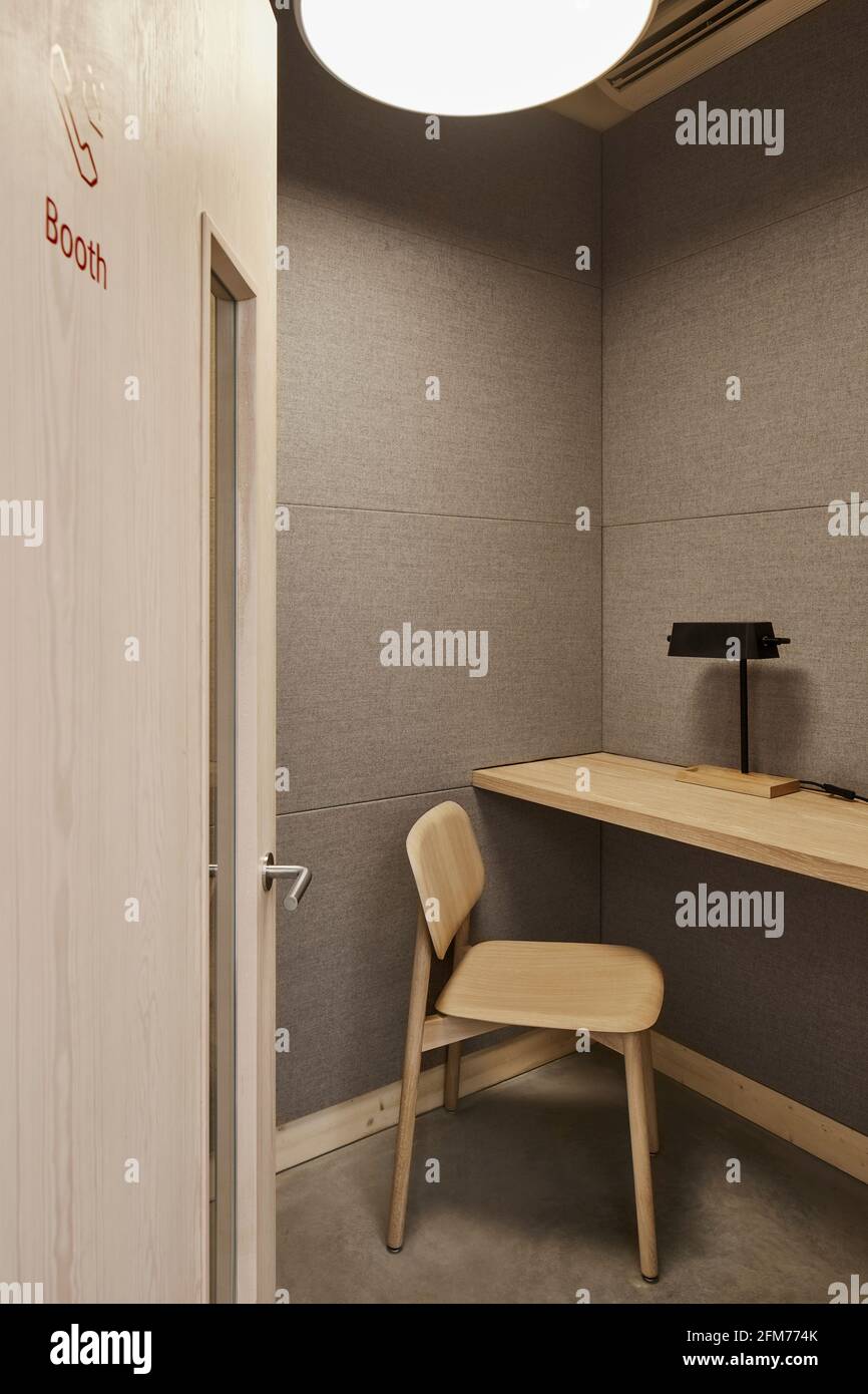 Phone booth with open door. Storey Orsman Road, London, United Kingdom. Architect: Waugh Thistleton Architects, 2021. Stock Photo