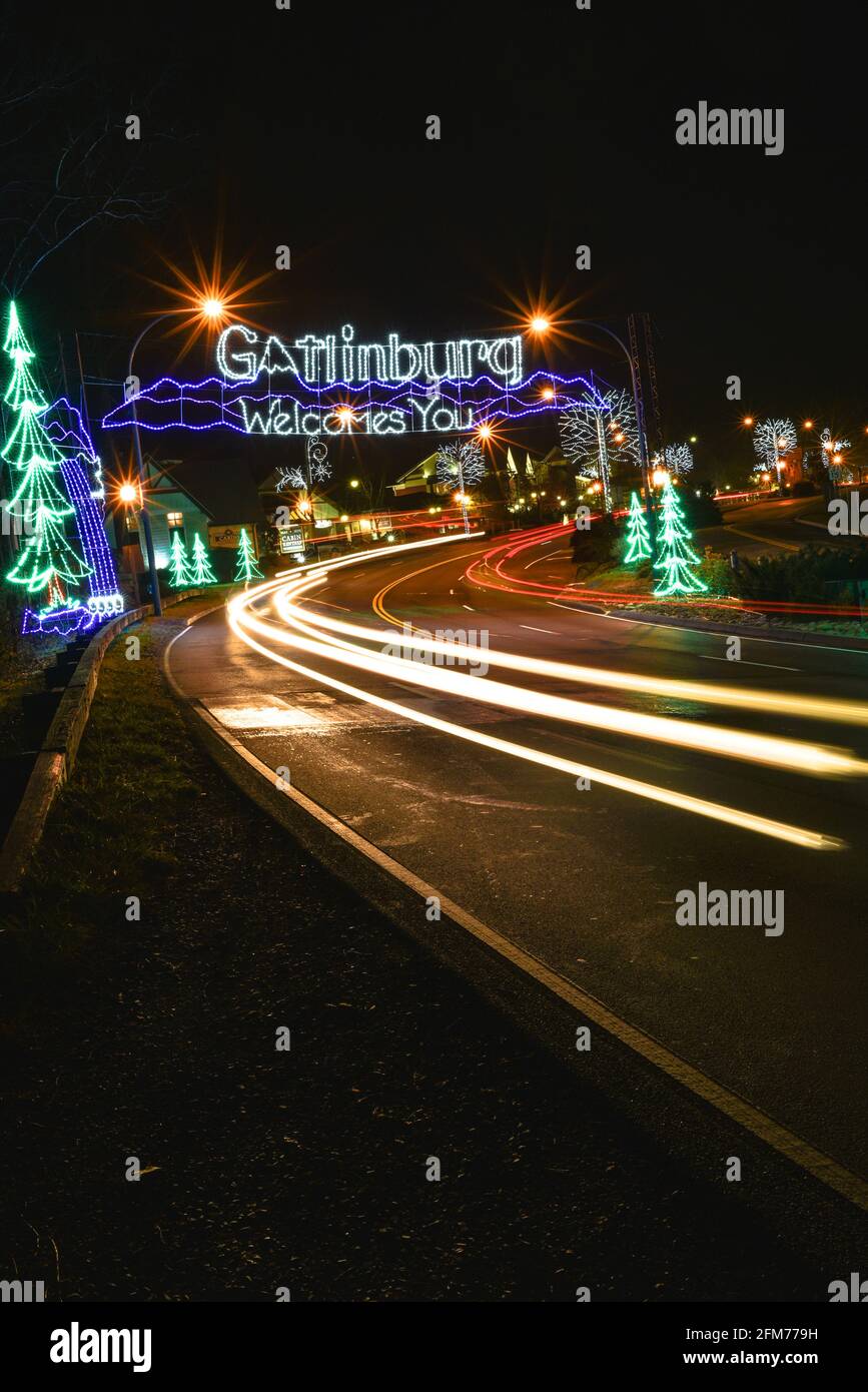Night view of decorated entrance to downtown Gatlinburg with Chrismas