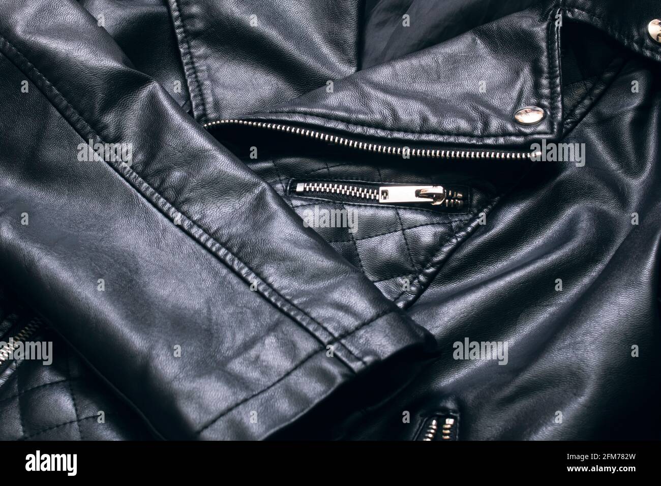 Black leather jacket with zip and stud close up Stock Photo