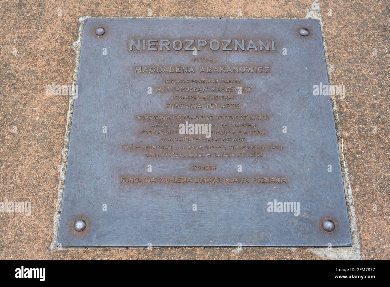 Poznan, wielkopolskie, Poland, 06.07.2019: Information plate on the 'Unrecognized' sculpture by Magdalena Abakanowicz in Cytadela Park, Poznan, Poland Stock Photo