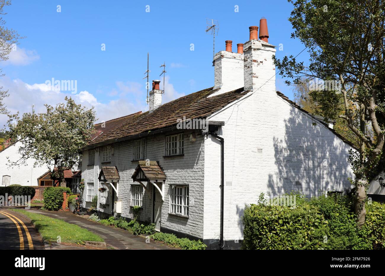 Cottages by Macclesfield Road in the Cheshire village of Prestbury Stock Photo