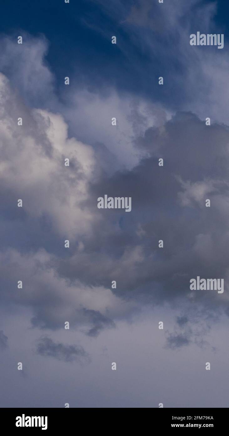 fluffy clouds in a blue sky Stock Photo