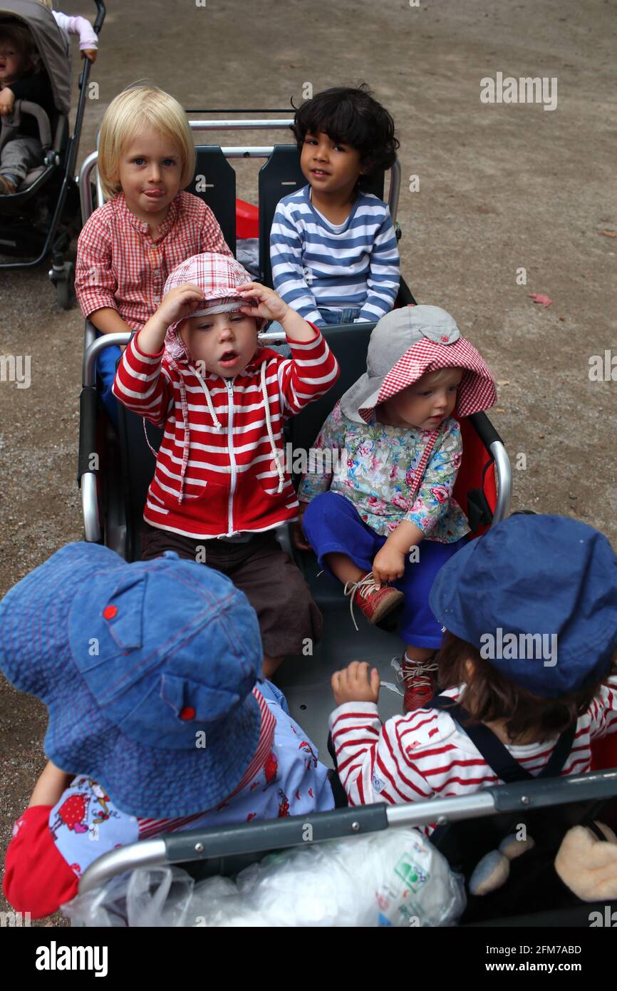 little children in pushchair taking a tour at zoo Stock Photo