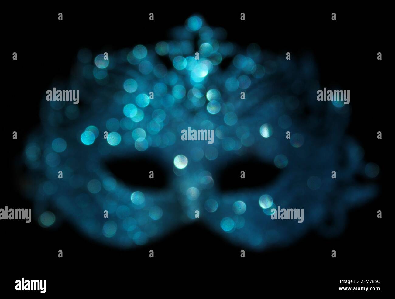 Blurred Blue Carnival Mask Bokeh Stock Photo - Alamy