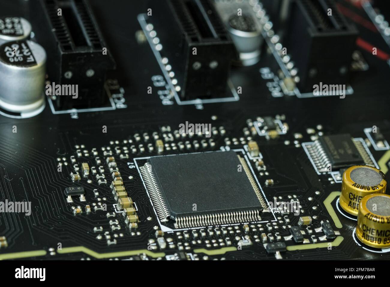 Electronic micro chip on hi tech pc motherboard,computer components chip Stock Photo